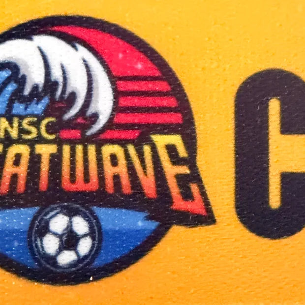 Close-up of a full-color dye-sublimation print on smooth polyester strap